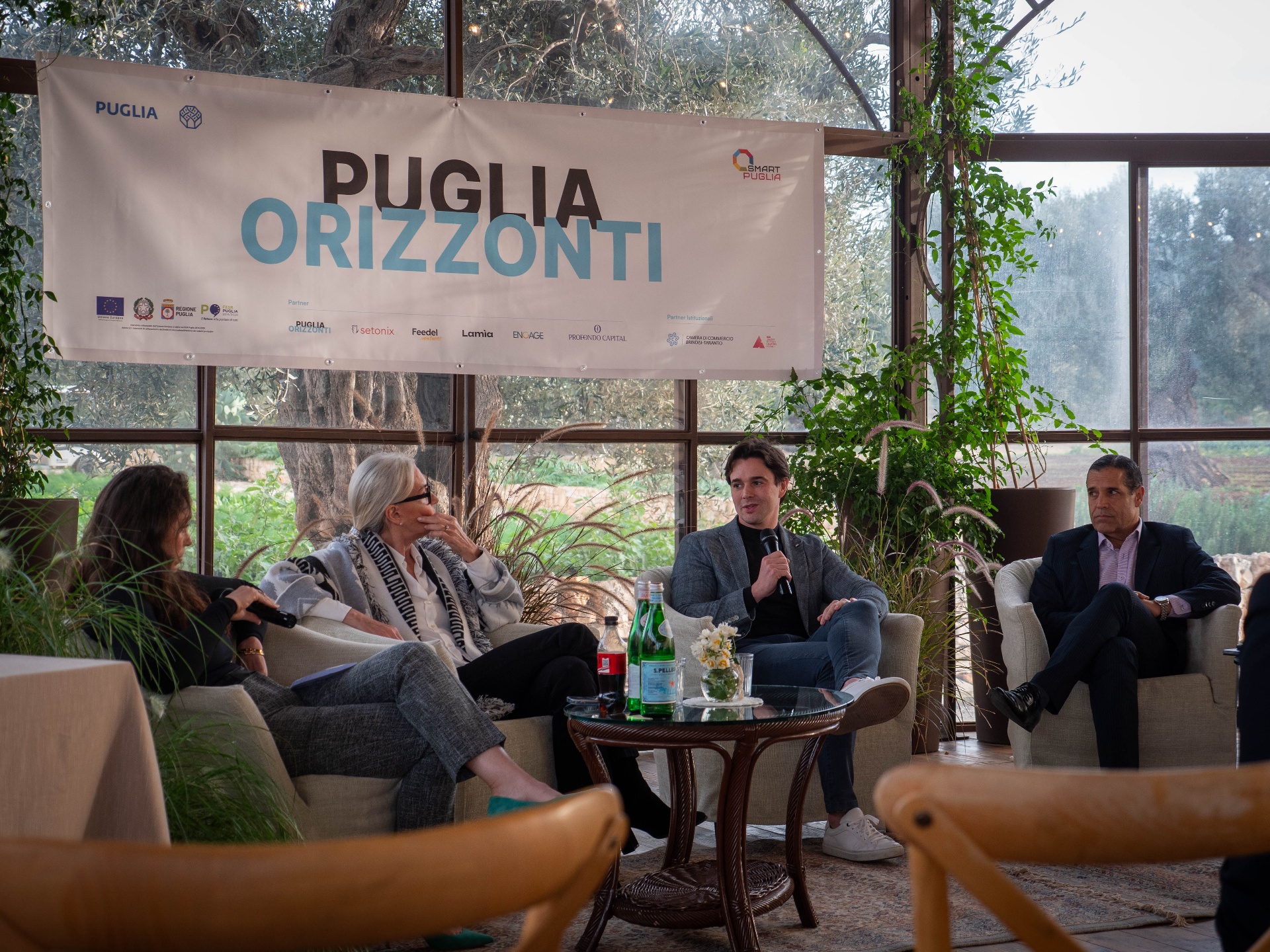 Puglia Orizzonti panel discussion in olive grove venue